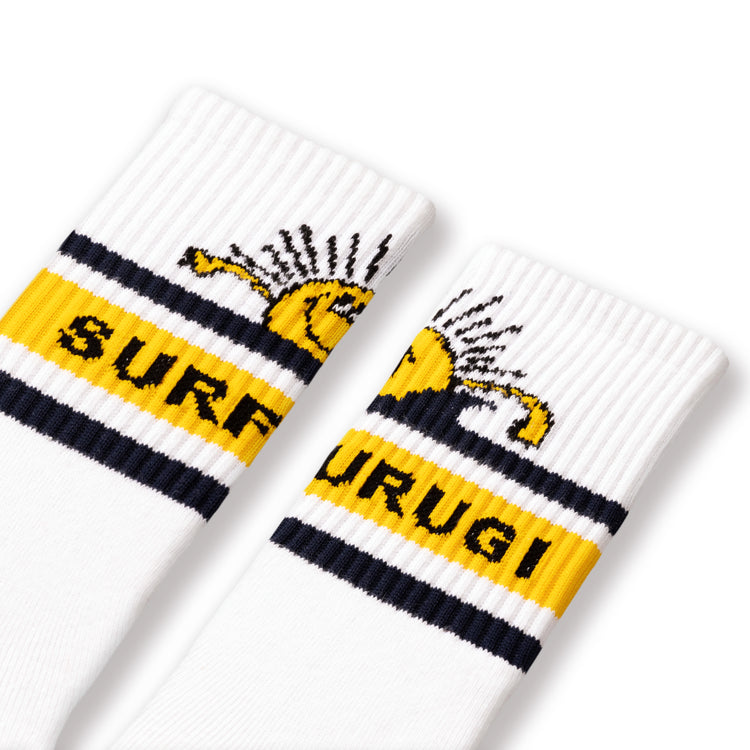 A pair of white surfing socks with a navy blue and yellow striped design, featuring the text 'SURFURUGI' and a graphic of a sun.