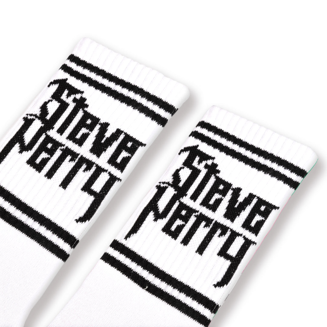 White socks with Black stripes and the words "Steve Perry" on the ankle.