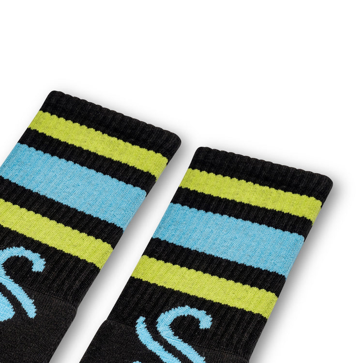 Black socks with green and blue stripes with "SUR" on the footbed