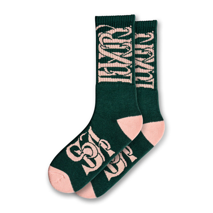 Green & pink socks with "Luxury Spa" branding