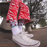 Roller skater  Olivia Wardlow wearing Extra Point Mushroom socks. They look groovy!