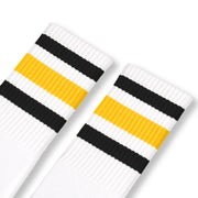 White w/ black & gold stripes
