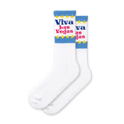 A pair of white socks with blue and yellow 'Viva Las Vegas' text and star patterns.